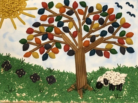 Homemade sheep grazing macaroni art